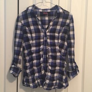 Blue plaid shirt with white and black